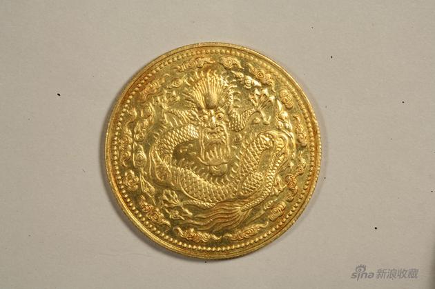 235b丁未大清金币一两，重量36、2克，直径38、9毫米。
